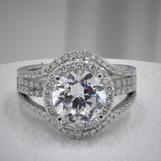 18 kt white gold engagement ring with a center princess cut diamond